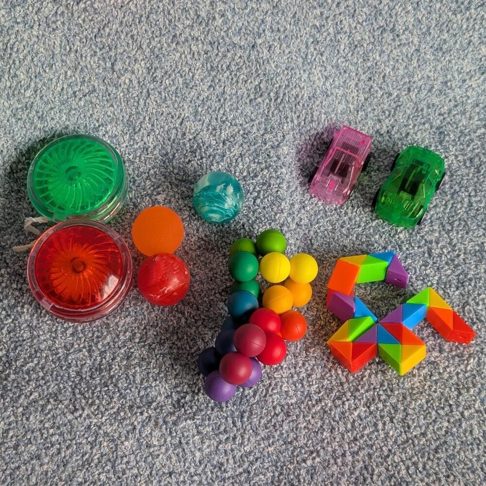 Assorted 9 Party Favors 3 Bouncy Balls 2 Yoyos 2 Cars 2 Sensory Manipulatives